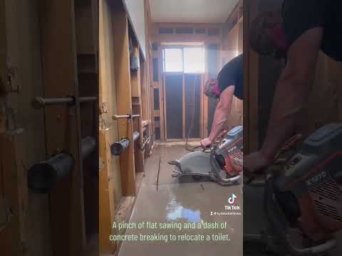 Cut and break! Relocating a toilet means removing concrete.